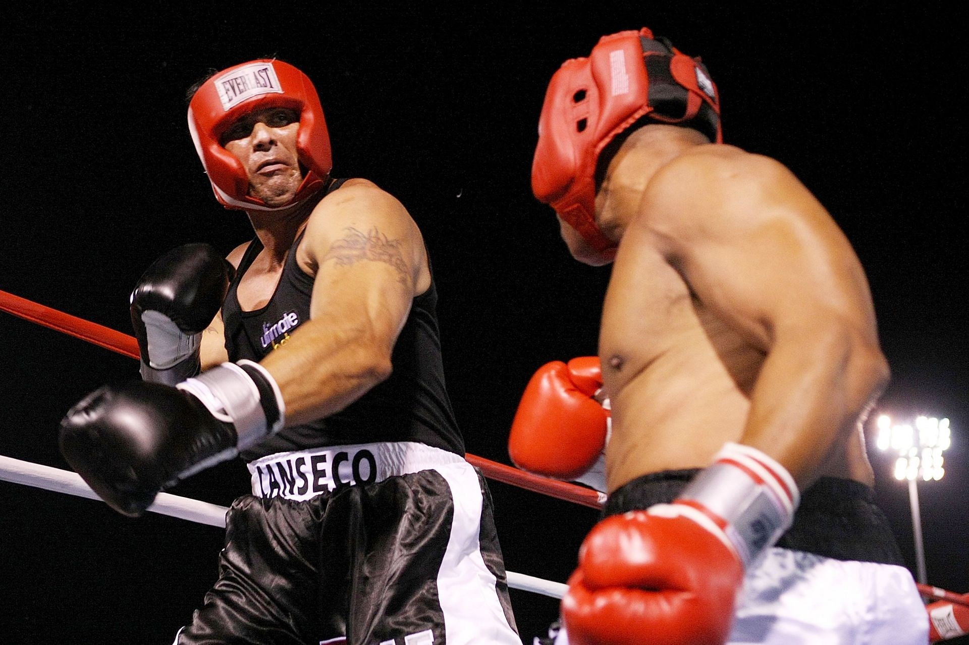Jose Canseco v Via Sikahema: ATLANTIC CITY, NJ - JULY 12: (L-R) Former Major League Baseball player Jose Canseco (L) swings a left at former NFL player Via Sikahema during their celebrity boxing match on July 12, 2008 at Bernie Robbins Stadium in Atlantic City, New Jersey. (Photo by Nick Laham/Getty Images)