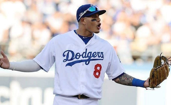 Christian Yelich Reportedly Called Manny Machado a Potty Word After NLCS  Play