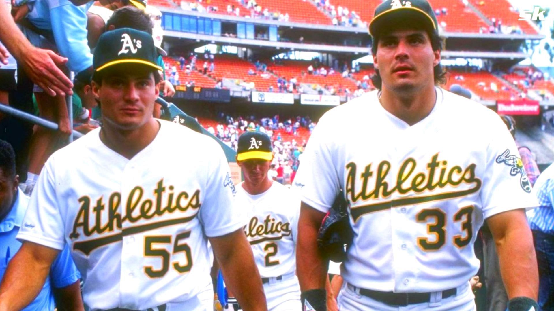 1990: THE CANSECO TWINS, OZZIE, LEFT, AND JOSE, WALK OFF THE FIELD AFTER THE OAKLAND A