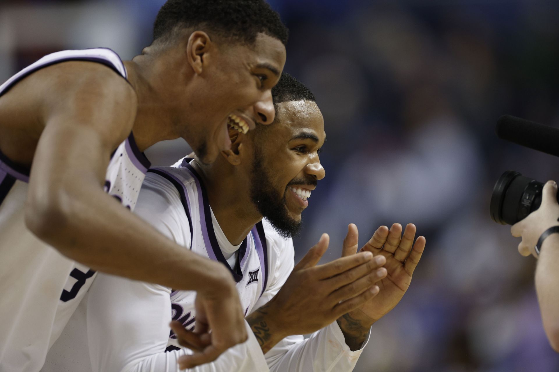 Desi Sills and Abayomi Iyiola of the Kansas State Wildcats