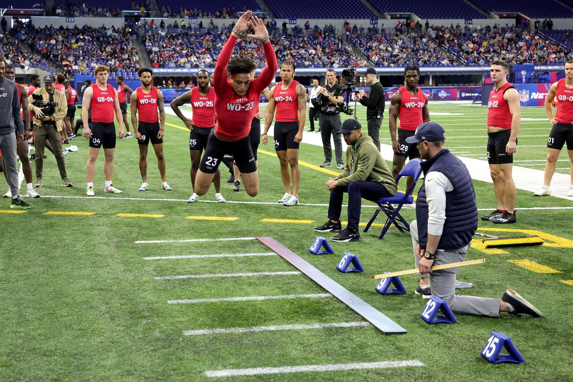 Hyatt doing the broad jump at the 2023 NFL combine