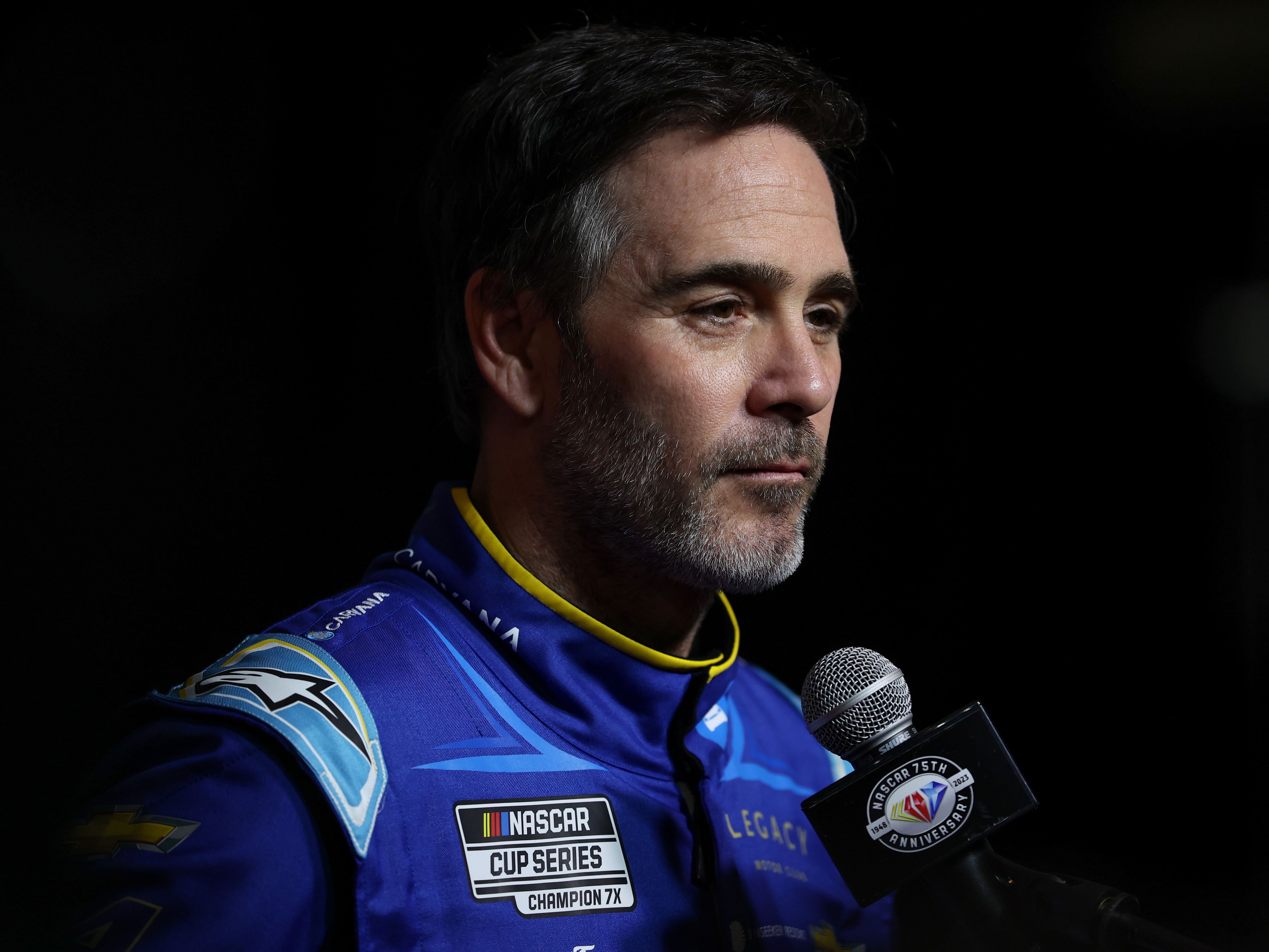 Jimmie Johnson, driver of the #84 Carvana Chevrolet, speaks to the media during the NASCAR Cup Series 65th Annual Daytona 500 Media Day at Daytona International Speedway on February 15, 2023 in Daytona Beach, Florida. (Photo by James Gilbert/Getty Images)