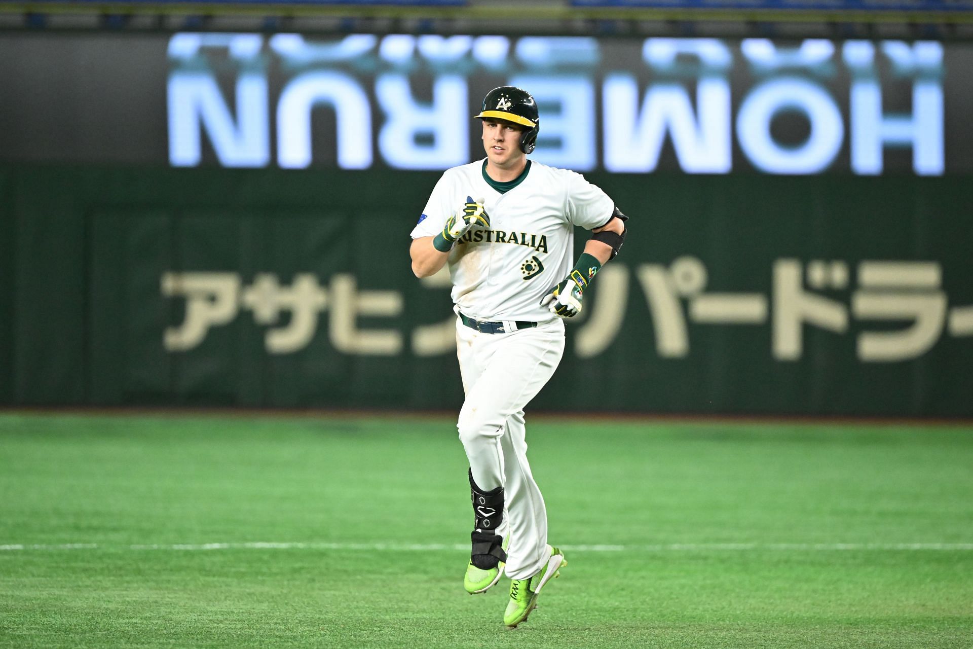 Robert Glendinning #6 of Team Australia hits a two run home run