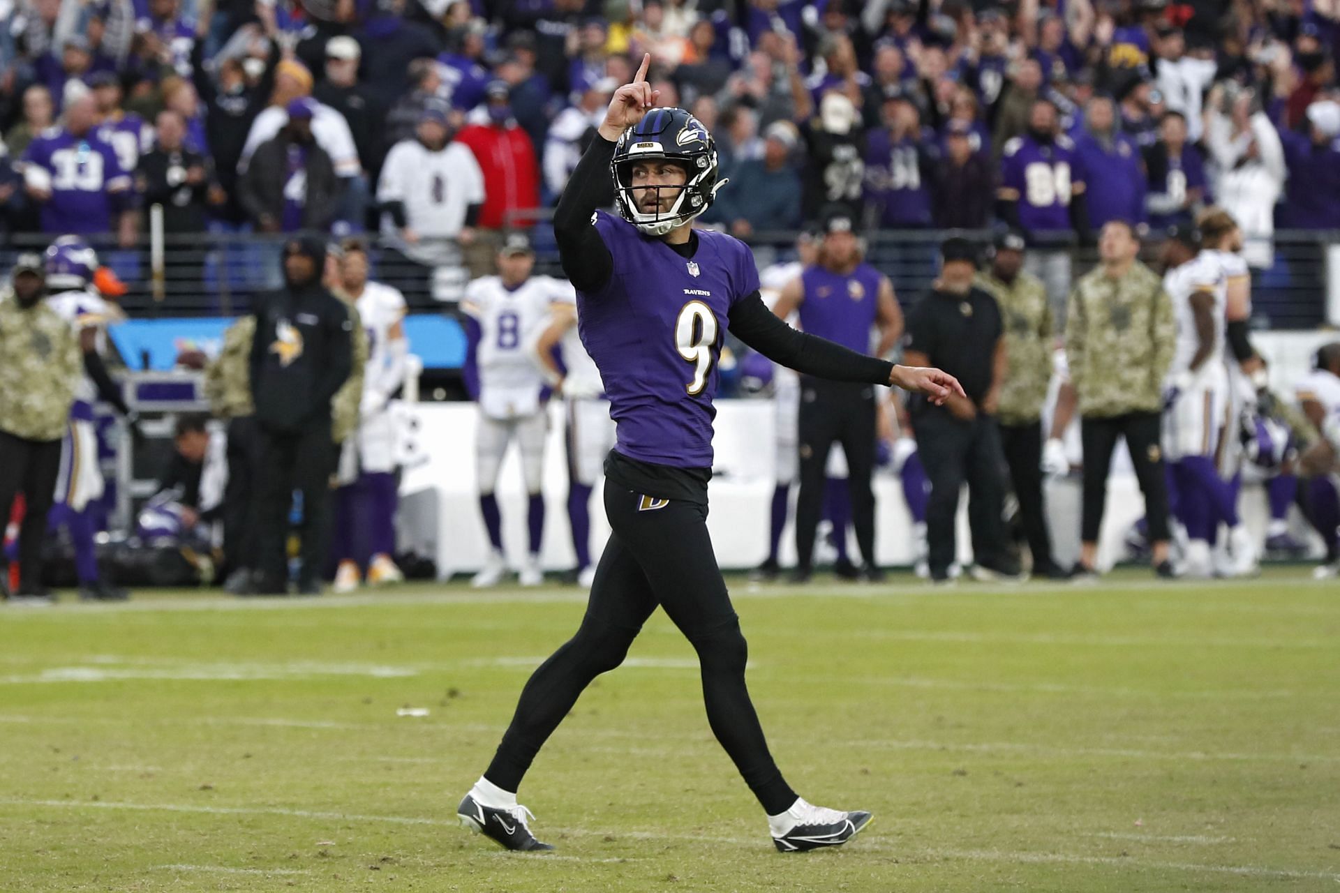 Justin Tucker #9 of the Baltimore Ravens reacts after kicking the game-winning field goal in overtime against the Minnesota Vikings
