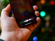 Using Apple's voice assistant on an iPhone (Image via iMore)