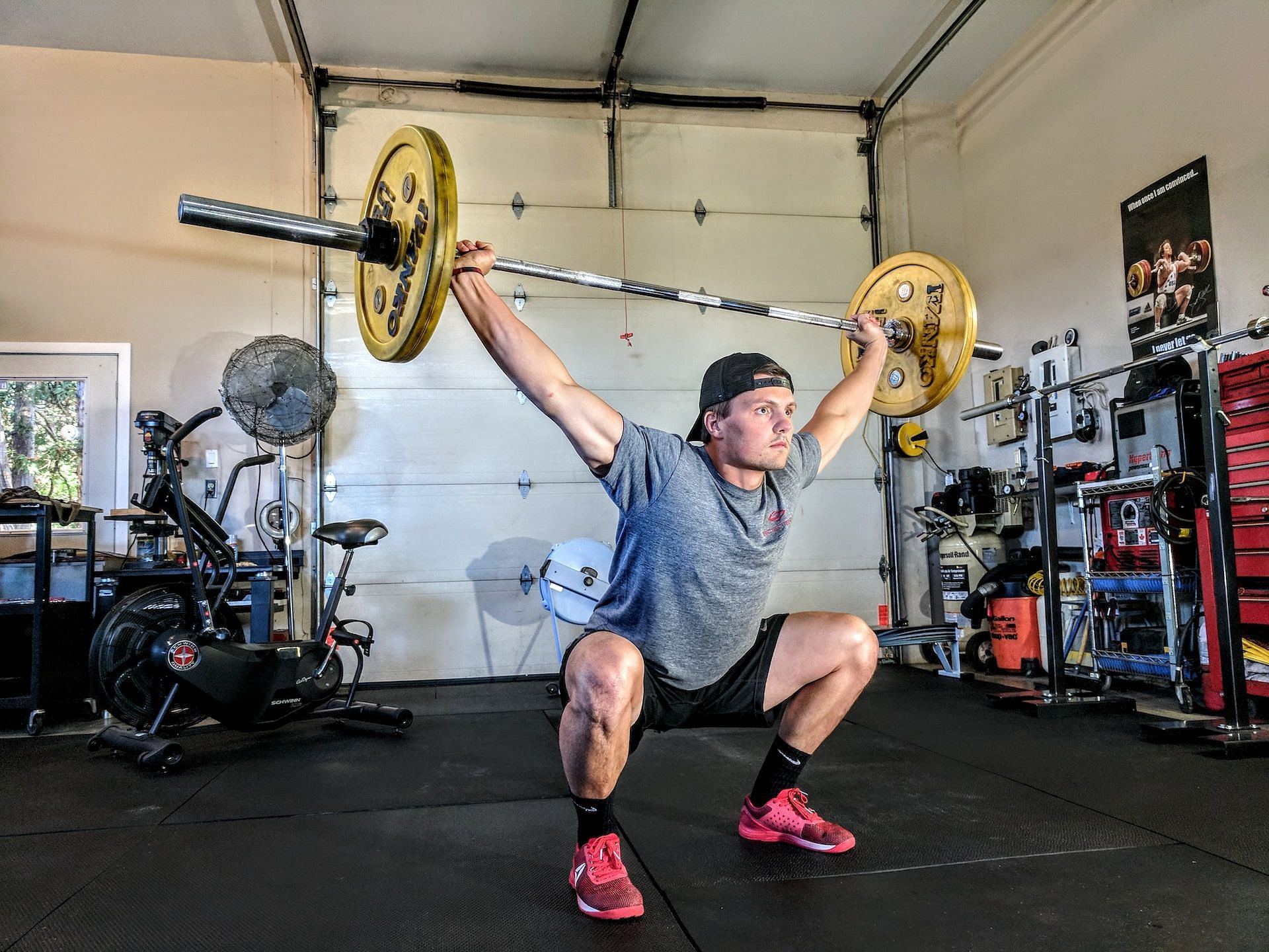 Overhead squats (Photo via Sam Sabourin/Unsplash)