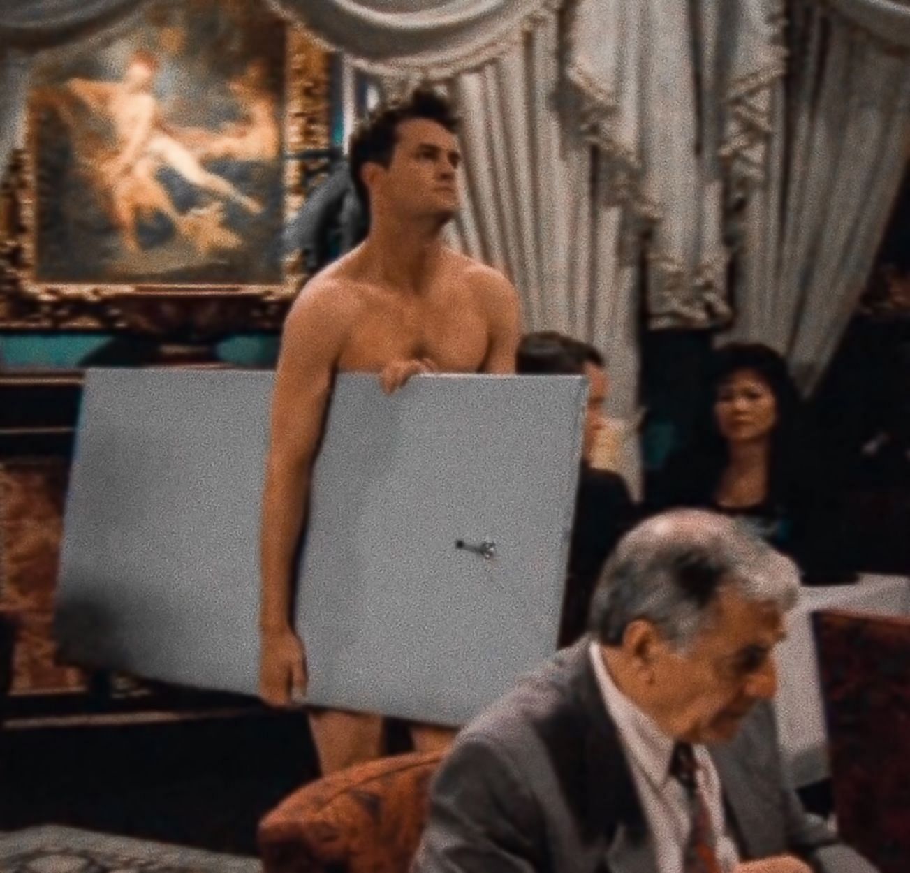 Chandler leaving the restaurant in underwear (Image via NBC)