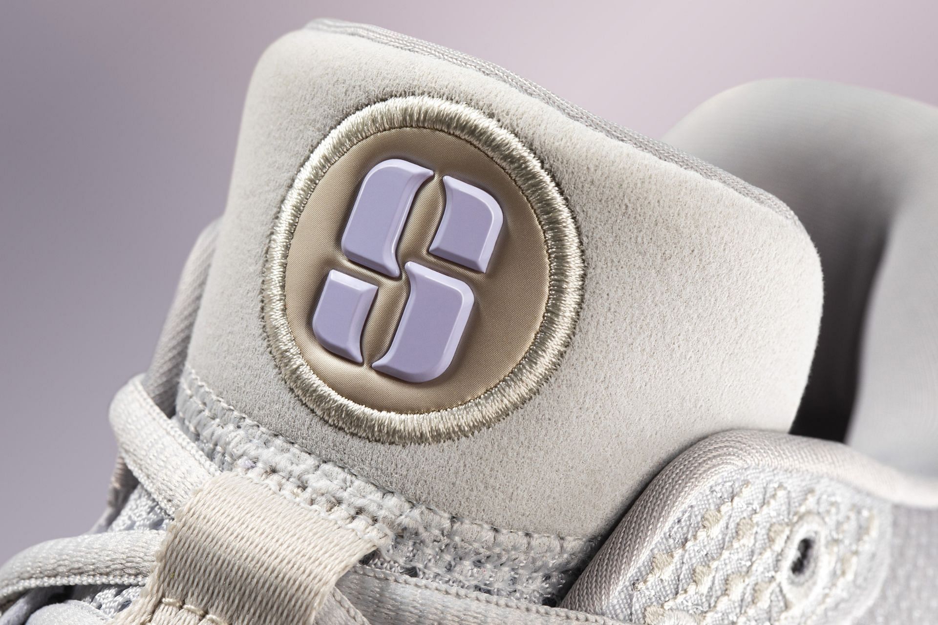 Take a closer look at the tongue area and branding accent of the Nike Sabrina 1 sneaker (Image via Nike)