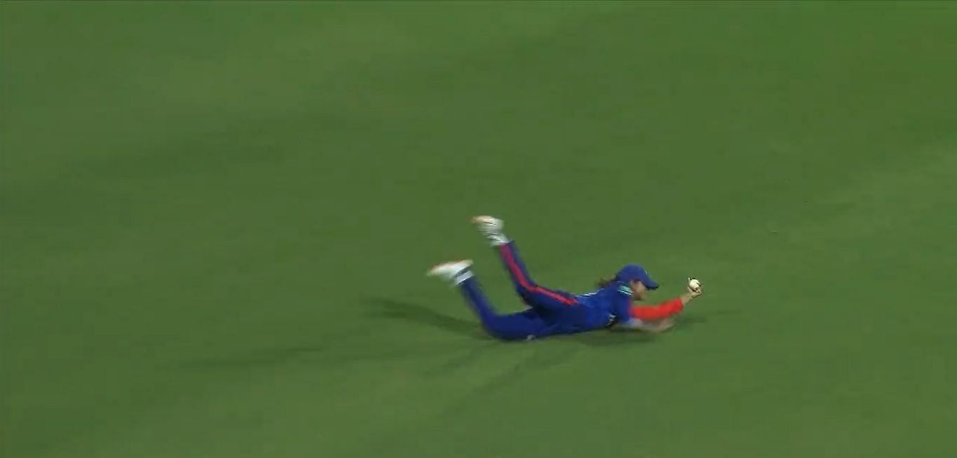 Radha Yadav took a well-judged diving catch in the match between DC and UPW. Pic: WPL