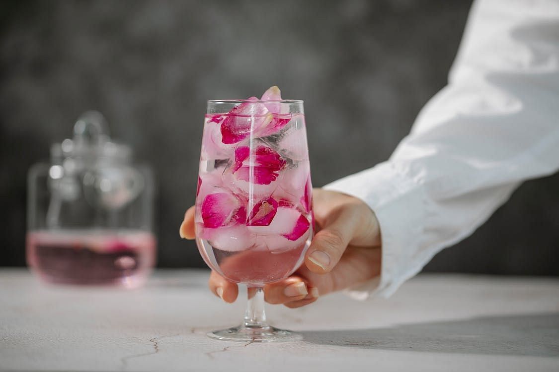 Rose water can be used as a refreshing facial mist throughout the day to hydrate and revitalize your skin. (Charlotte May/ Pexels)