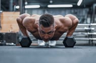 Push-ups with weights (Image via Pexels/Krzysztof Biernat)