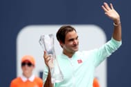 Roger Federer with the Miami Open trophy.