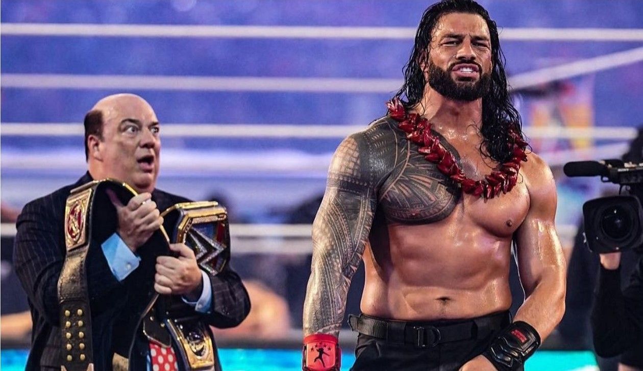 Paul Heyman (left) and Roman Reigns (right)