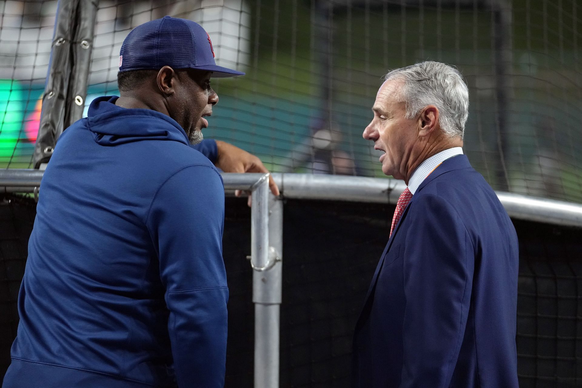 MLB commissioner Rob Manfred speaks with Team USA coach Ken Griffey Jr.