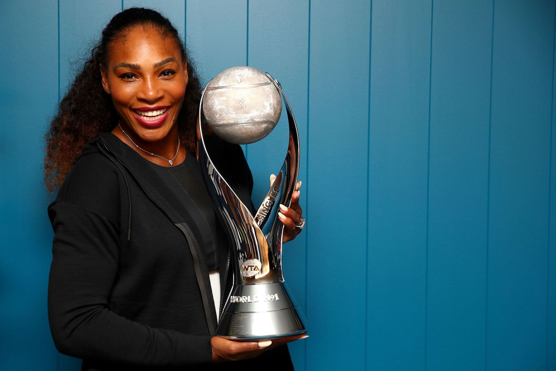 Serena Williams with the year-end World No. 1 trophy.