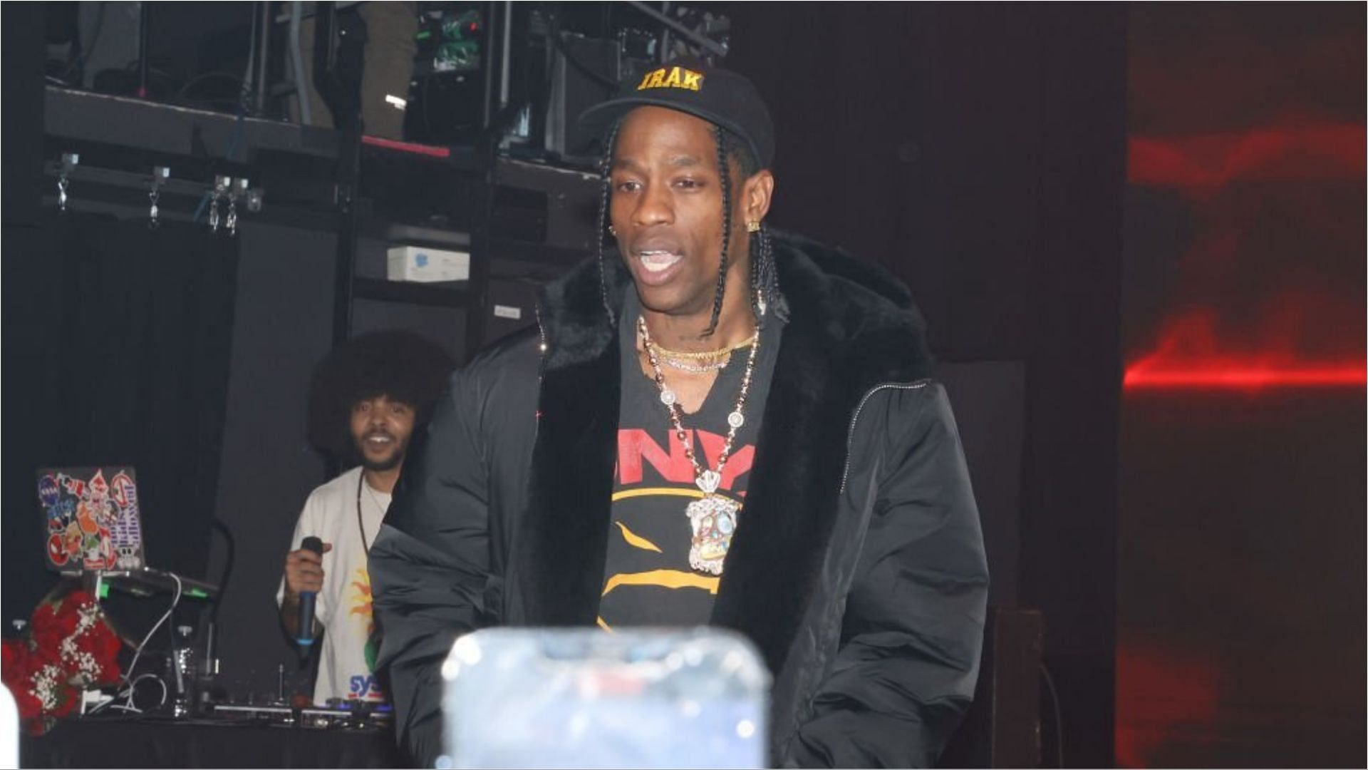 Travis Scott is reportedly wanted by the cops after punching a man inside the club (Image via Johnny Nunez/Getty Images)