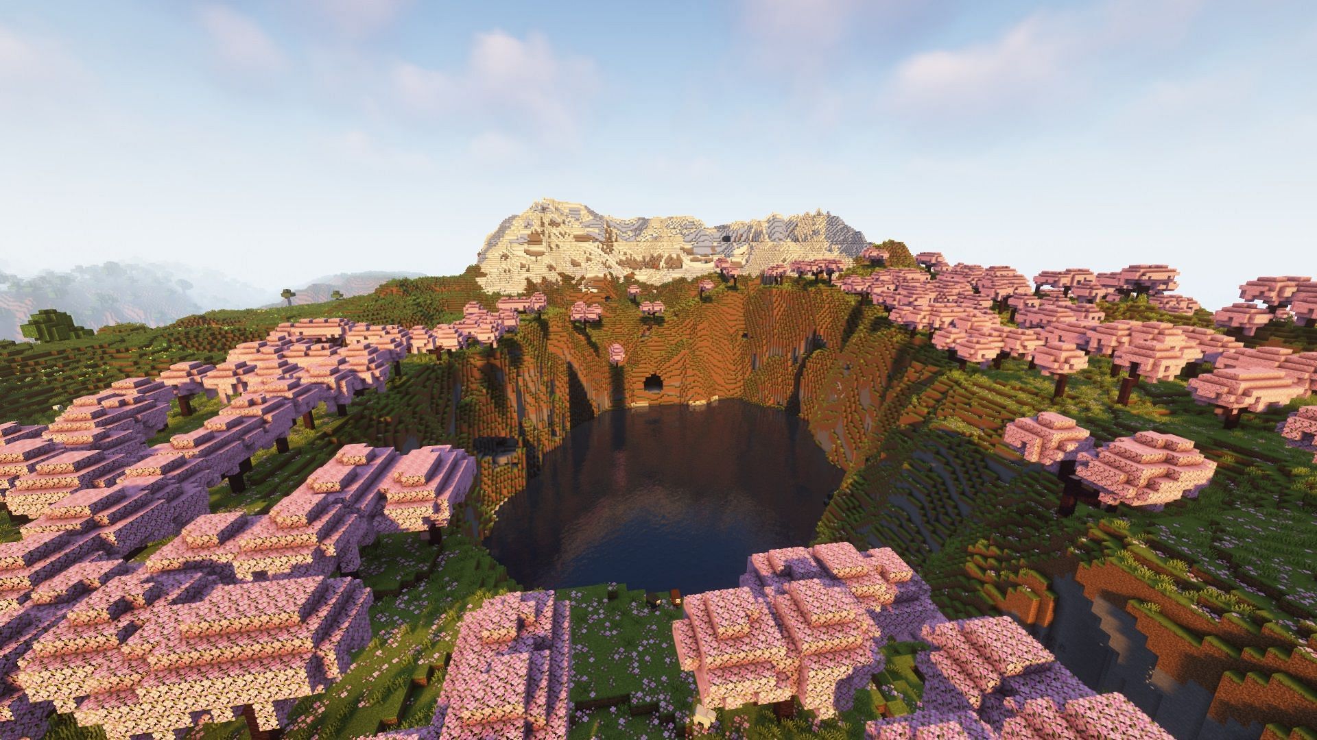 A cherry groves biome encircling a deep lake (Image via Mojang)