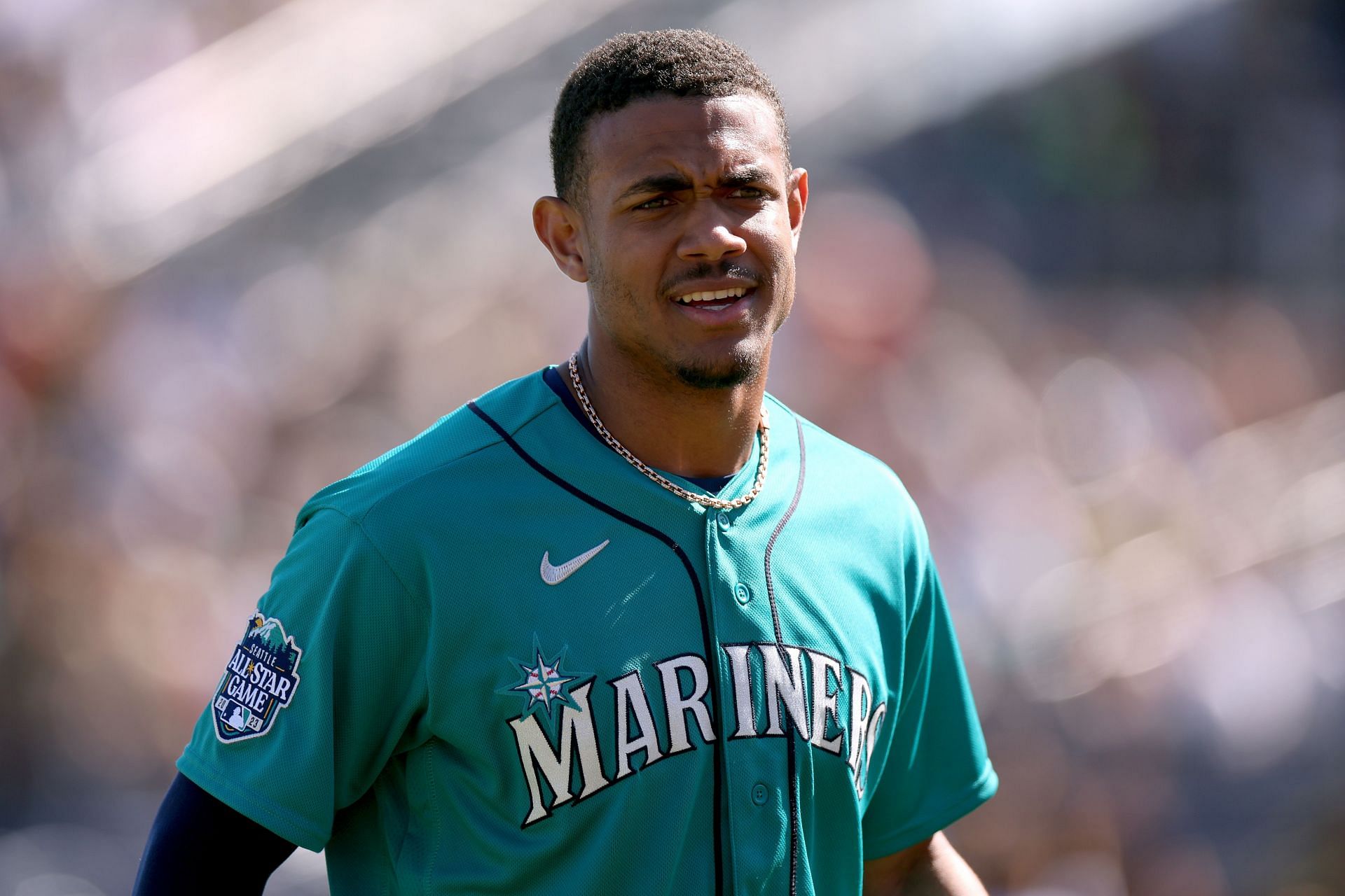 Julio Rodriguez of the Seattle Mariners looks on in a spring training game.