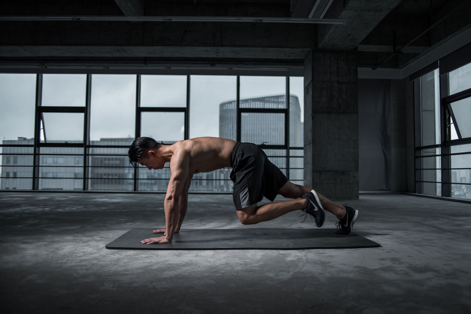Burpees also help workout your deltoid muscles (Image via Pexels @Li Sun)
