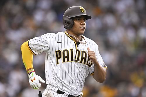 Juan Soto #22 of the San Diego Padres advances to first base on a walk in the first inning against the Colorado Rockies August 3, 2022 at Petco Park in San Diego, California. Soto and Josh Bell were acquired by Padres from the Washington Nationals in a deal announced yesterday that sends a slew of prospects and veteran Luke Voit to the Nationals.