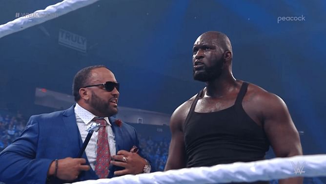 40-year-old star wants WWE to send Omos to "developmental" and "teach him how to wrestle" (Exclusive)