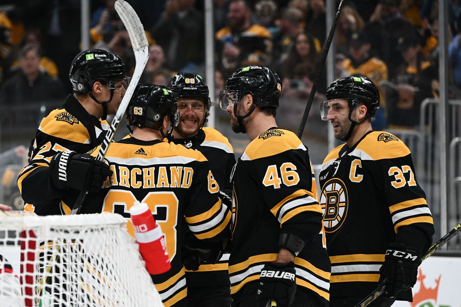 David Krejci #46 of the Boston Bruins celebrates scoring a goal against the Ottawa Senators with teammates Hampus Lindholm #27, Brad Marchand #63, David Pastrnak #88 and &lt;a href=&#039;https://www.sportskeeda.com/us/nhl/patrice-bergeron&#039; target=&#039;_blank&#039; rel=&#039;noopener noreferrer&#039;&gt;Patrice Bergeron&lt;/a&gt; #37 during the first period at the TD Garden on March 21, 2023 in Boston, Massachusetts. (Photo by Brian Fluharty/Getty Images)