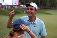 Scottie Scheffler celebrates with his wife Meredith Scudder after winning The Players Championship at TPC Sawgrass