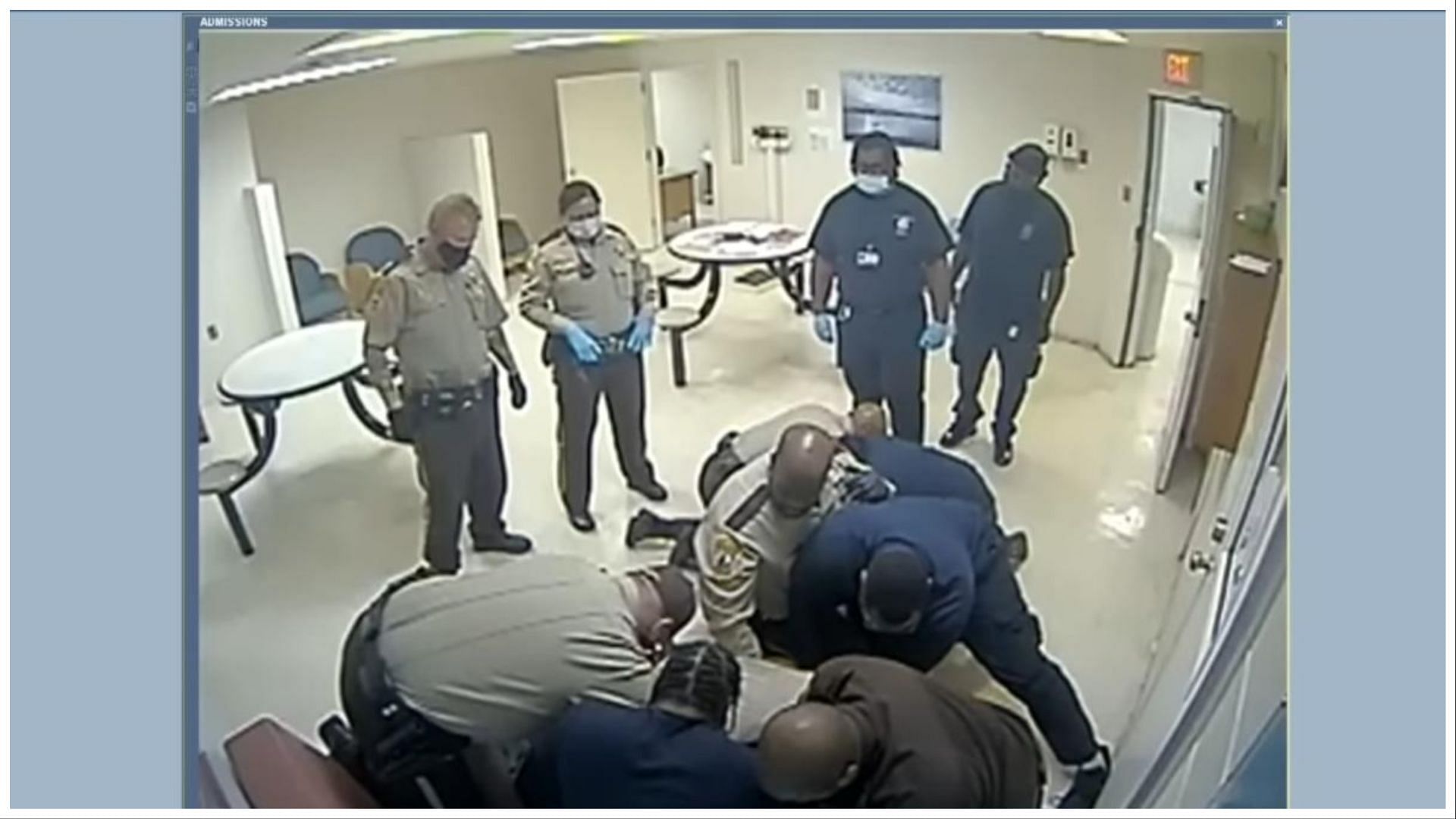 Hospital surveillance footage captured a group of ten officials trying to subdue Otieno, (Image via WTVR CBS 6/YouTube)