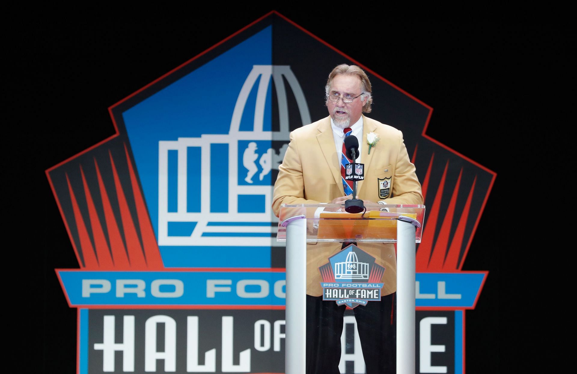Kevin Greene, former NFL linebacker, speaks during his Pro Football Hall of Fame induction speech Enter caption