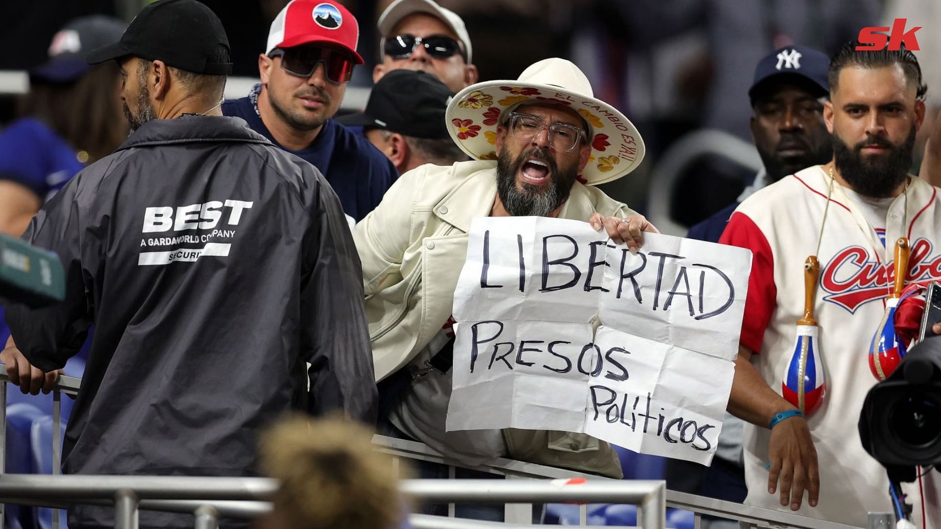 USA vs Cuba WBC semi-final interrupted by activists demanding end of Communist rule in Caribbean nation