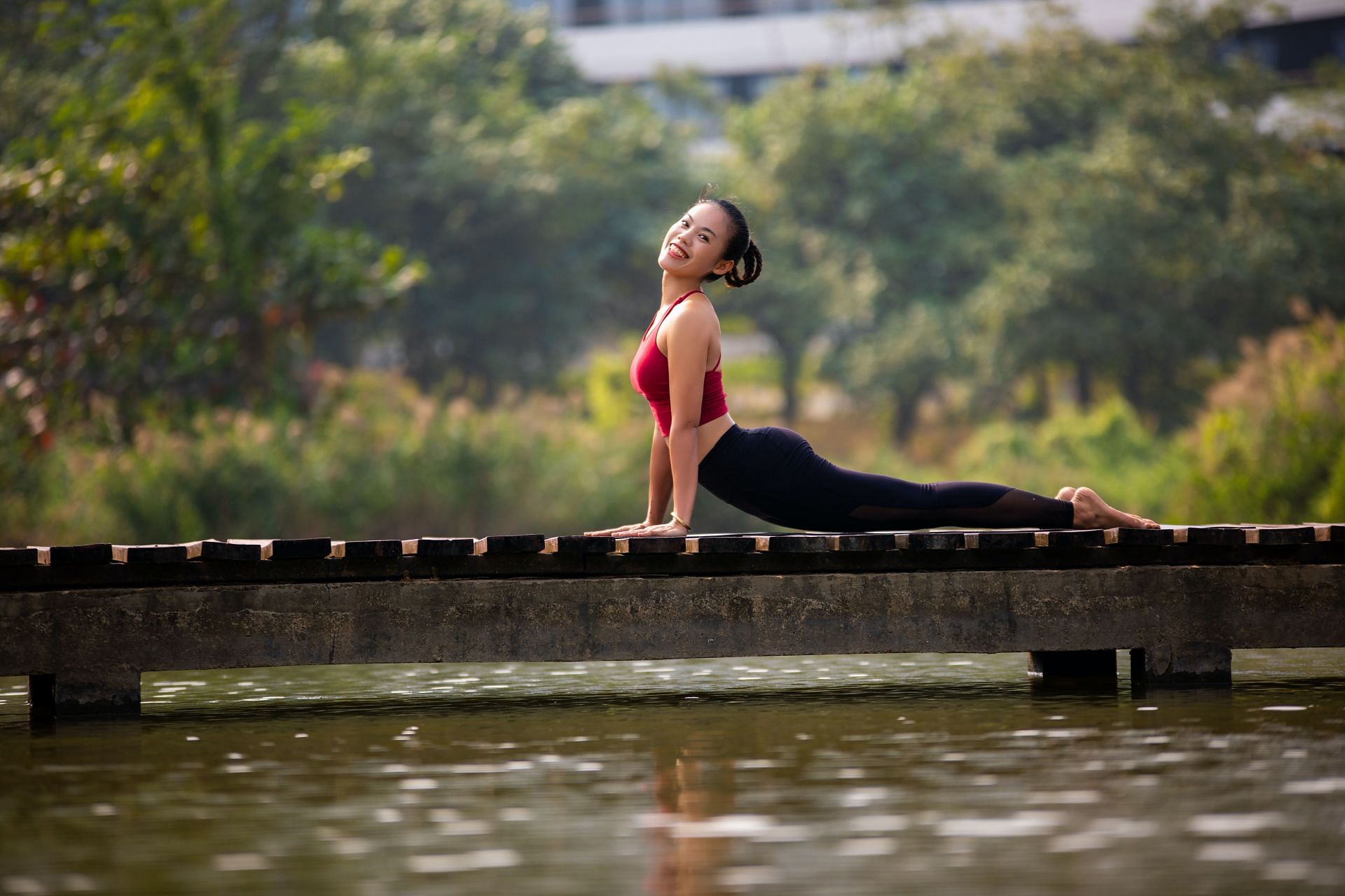 Backbends are known for strengthening the back. (Image via Pexels/Shu Lei)