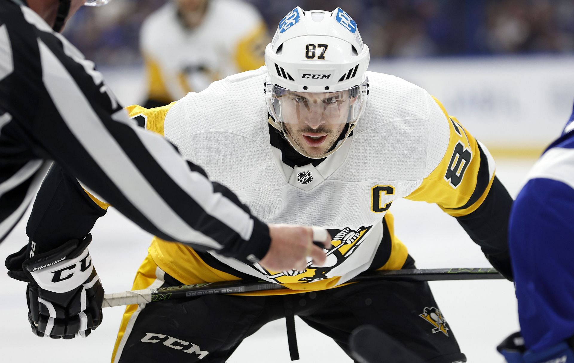 Sidney Crosby #87 of the Pittsburgh Penguins faces off against the Tampa Bay Lightning