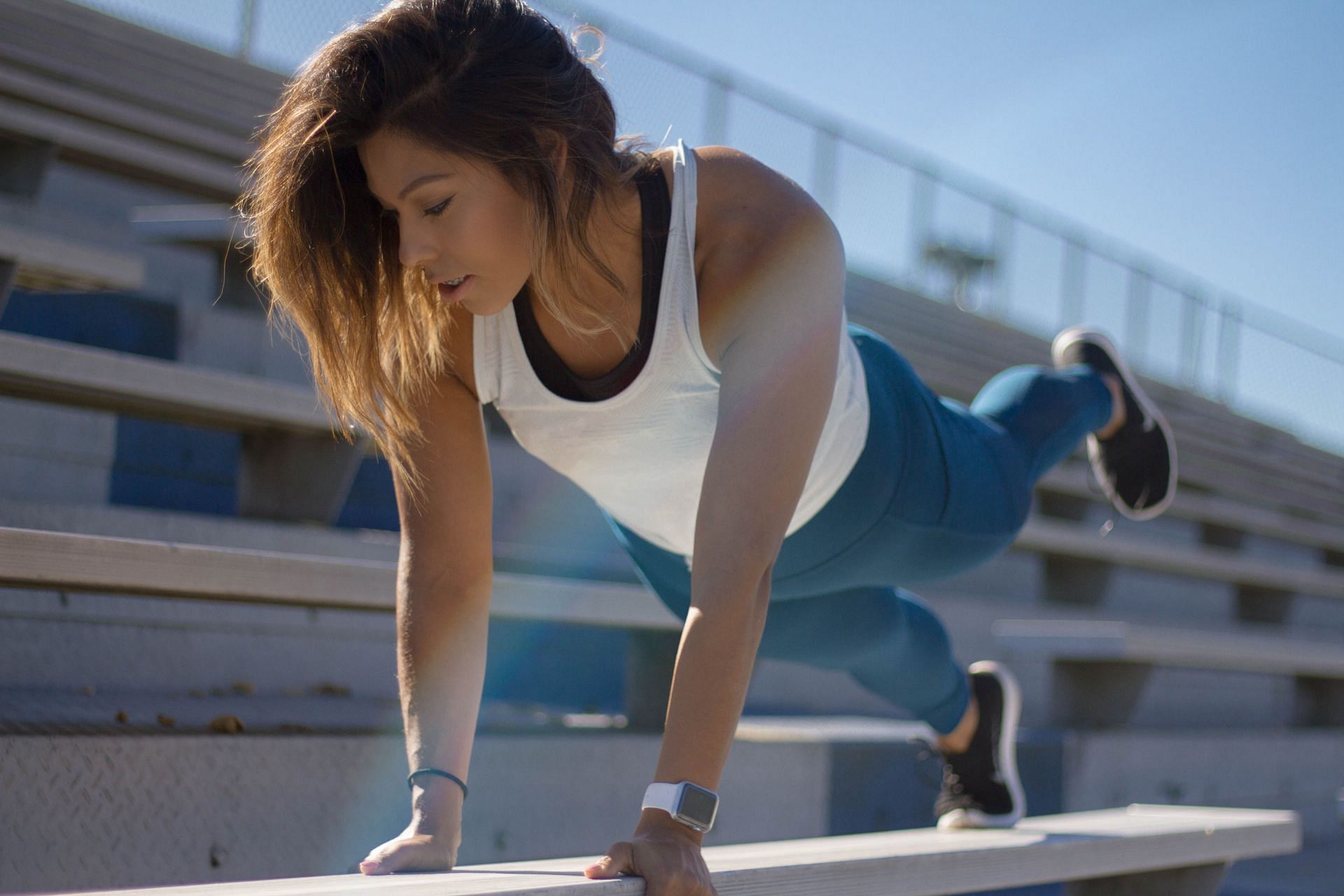 Proper hydration is necessary to avoid exercise headaches. (Image via Unsplash/Julia Ballew)