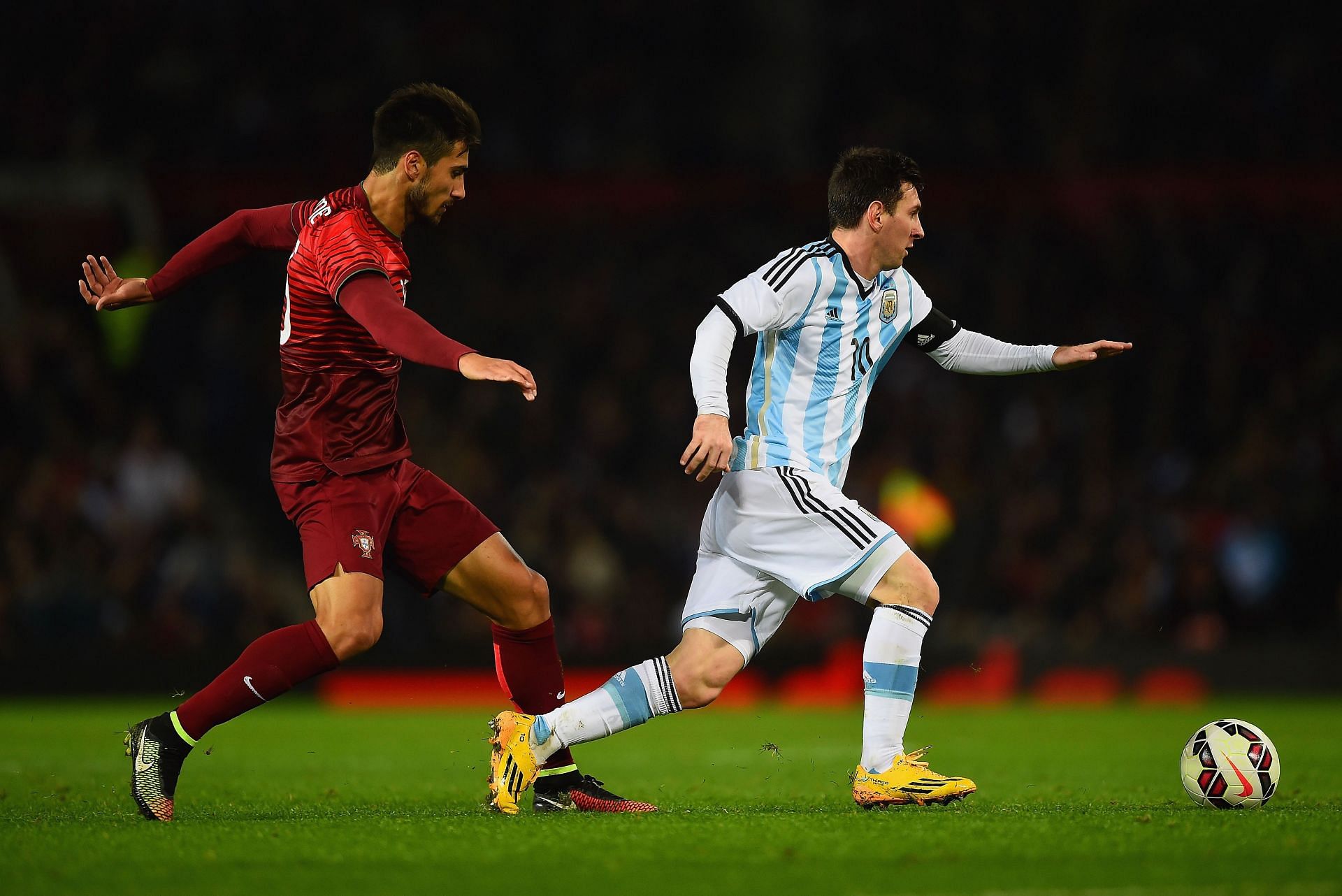 Lionel Messi (right) in action against Portugal.