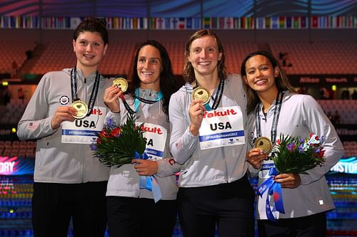 Claire Weinstein, Leah Smith, Katie Ledecky, and Bella Sims of Team United States pose with their medals during the medal ceremony for the Women's 4x200m Freestyle Final on day five of the Budapest 2022 FINA World Championships