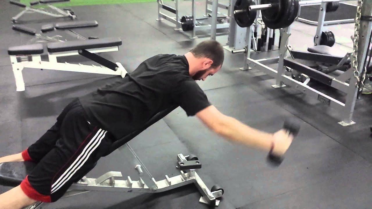 Prone Trap Raise is a highly effective exercise that primarily targets the trapezius muscles in the upper back and shoulders (Spurling Fitness/ Youtube)