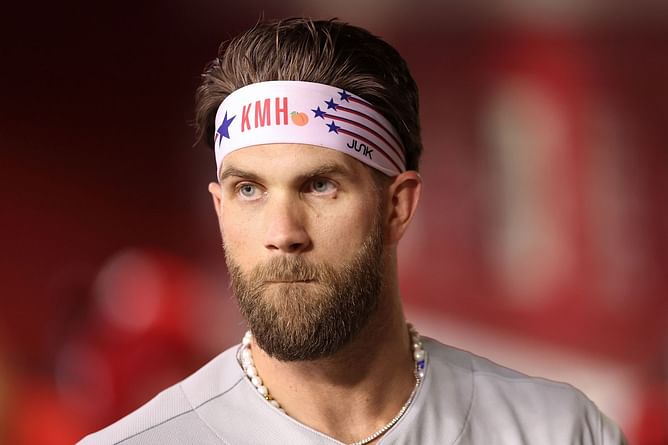 MLB fans mock Bryce Harper as injured star says he can play until the age of 45: "He's not even playing in April"