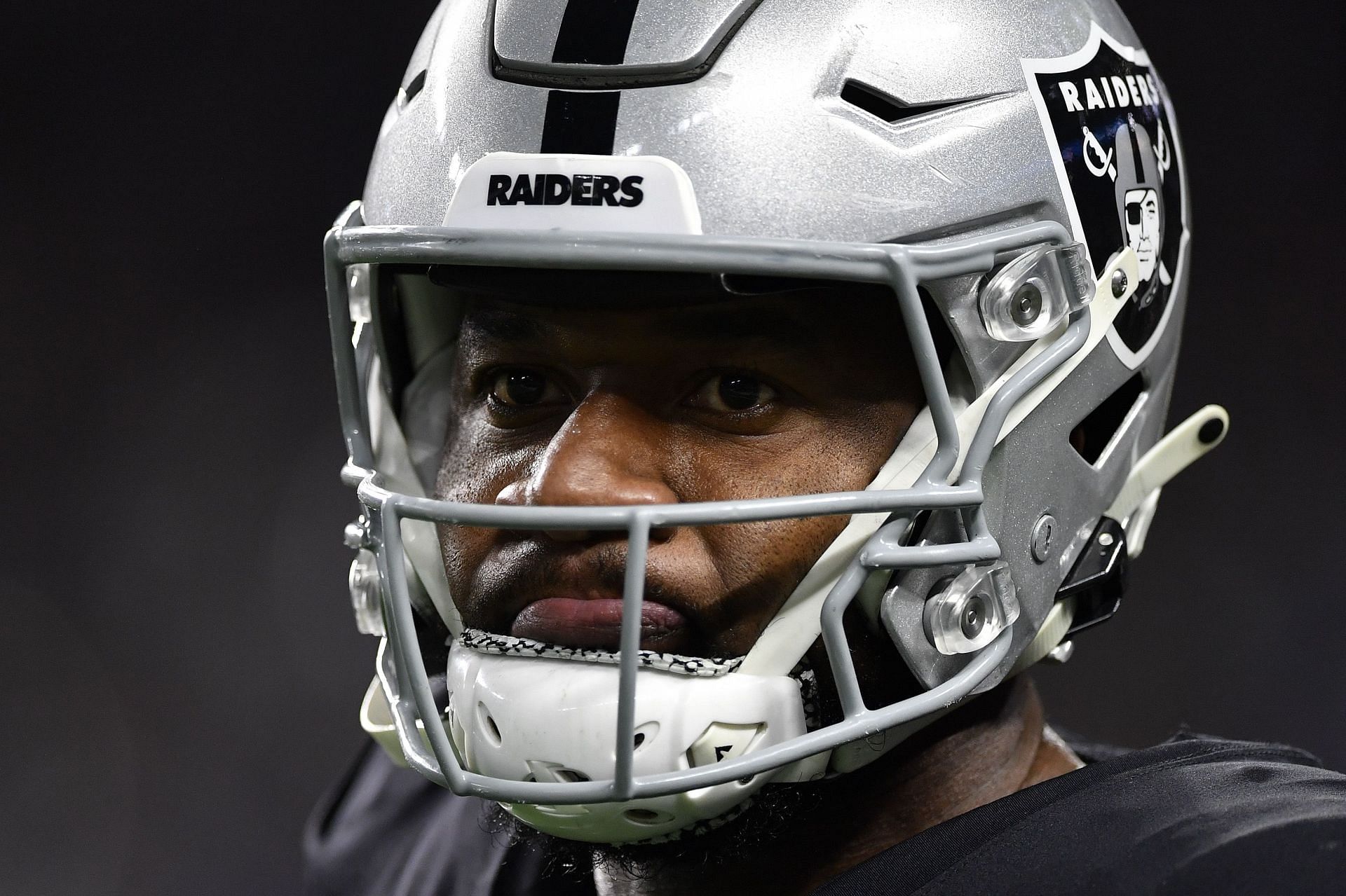 Yannick Ngakoue of the Las Vegas Raiders looks on before playing against the Los Angeles Chargers.