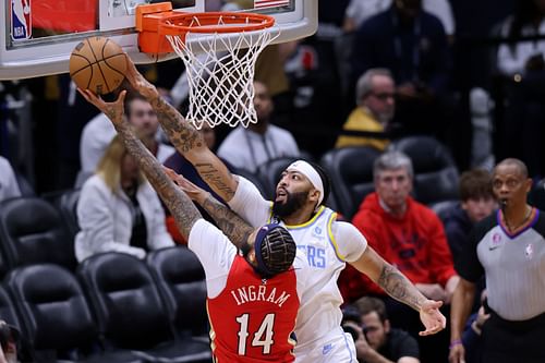 LA Lakers star forward Anthony Davis (right) blocking New Orleans Pelicans star Brandon Ingram