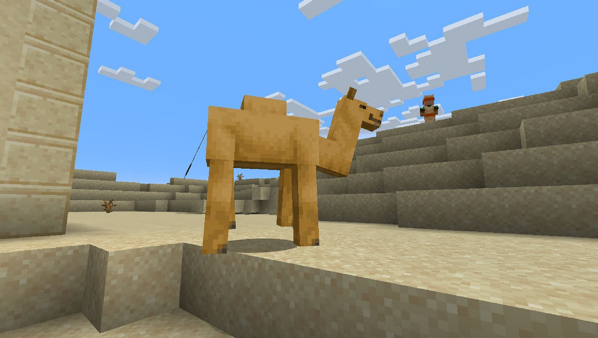 A camel roams a desert village in Minecraft Java snapshot 23w12a (Image via Mojang)