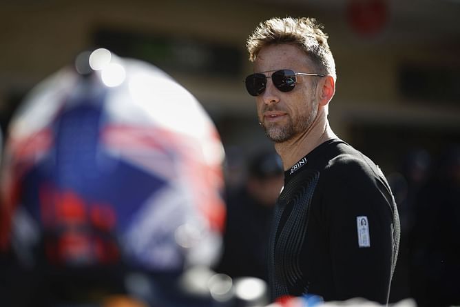 “What are you doing here?”: Jenson Button shares a light moment with Bubba Wallace