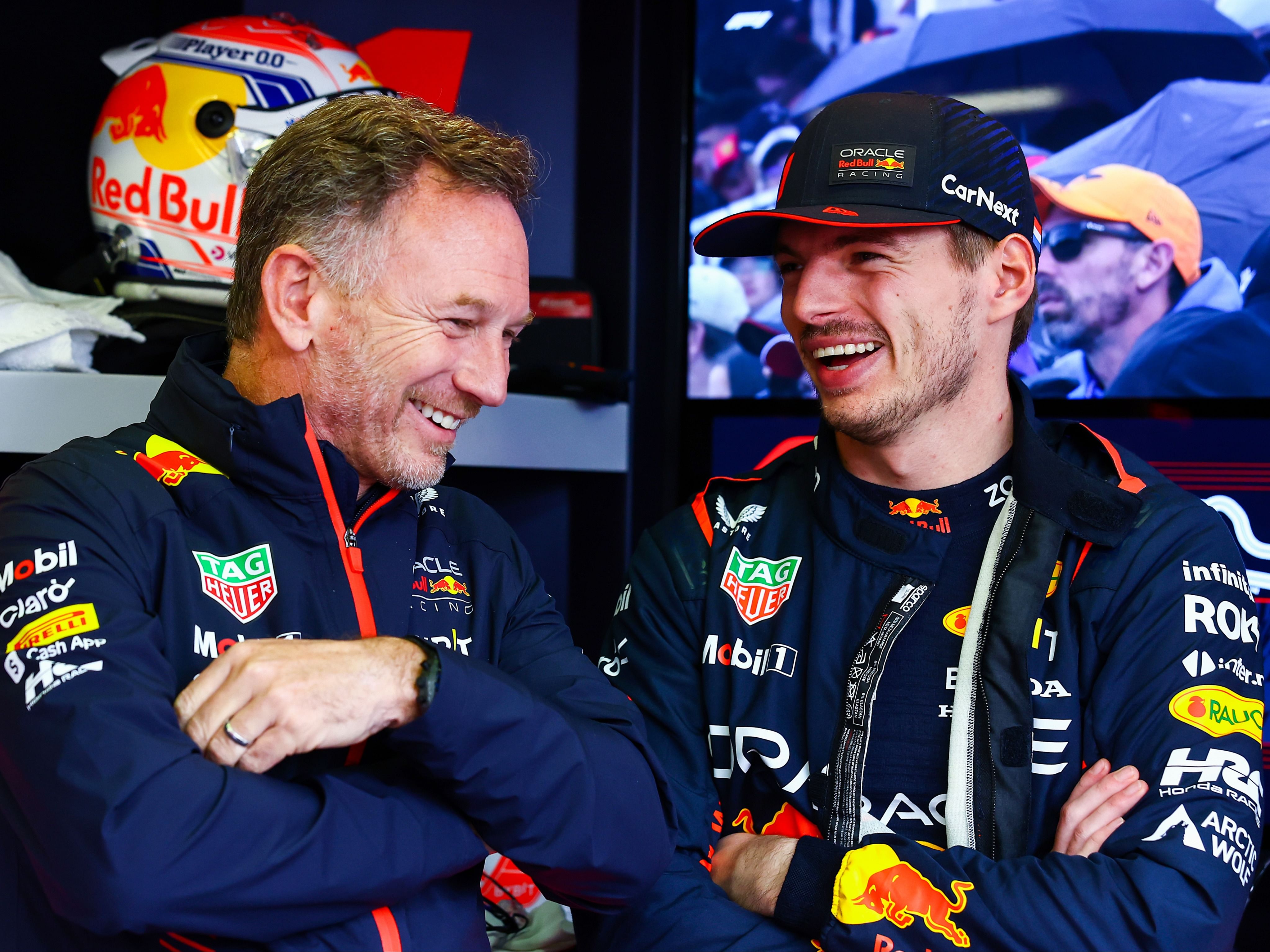 Christian Horner talks with Max Verstappen in the garage during qualifying ahead of the 2023 F1 Australian Grand Prix (Photo by Mark Thompson/Getty Images)