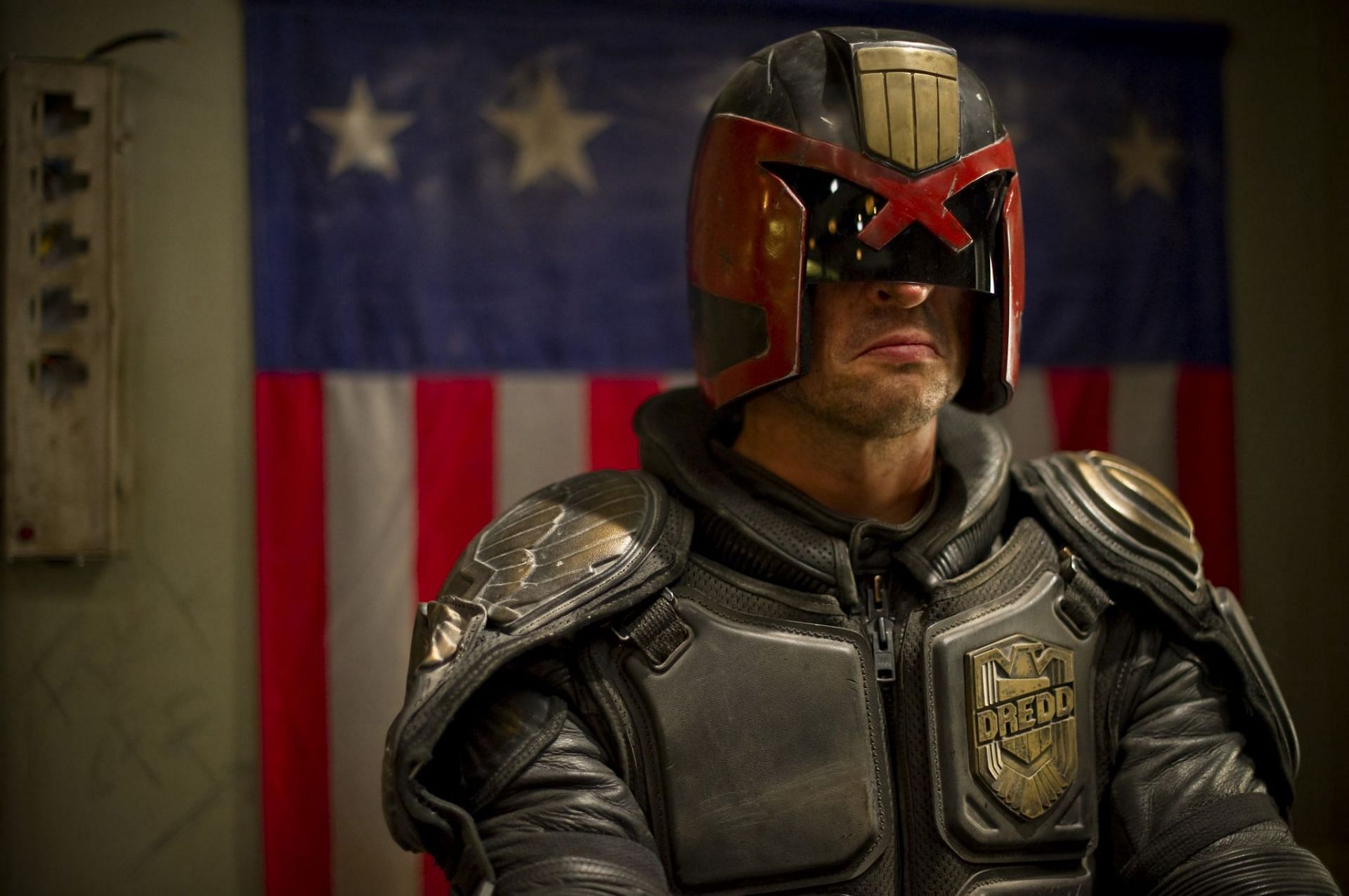 Karl Urban delivers an unforgettable performance as Judge Dredd in this gritty and violent comic book adaptation (Image via DNA Films)