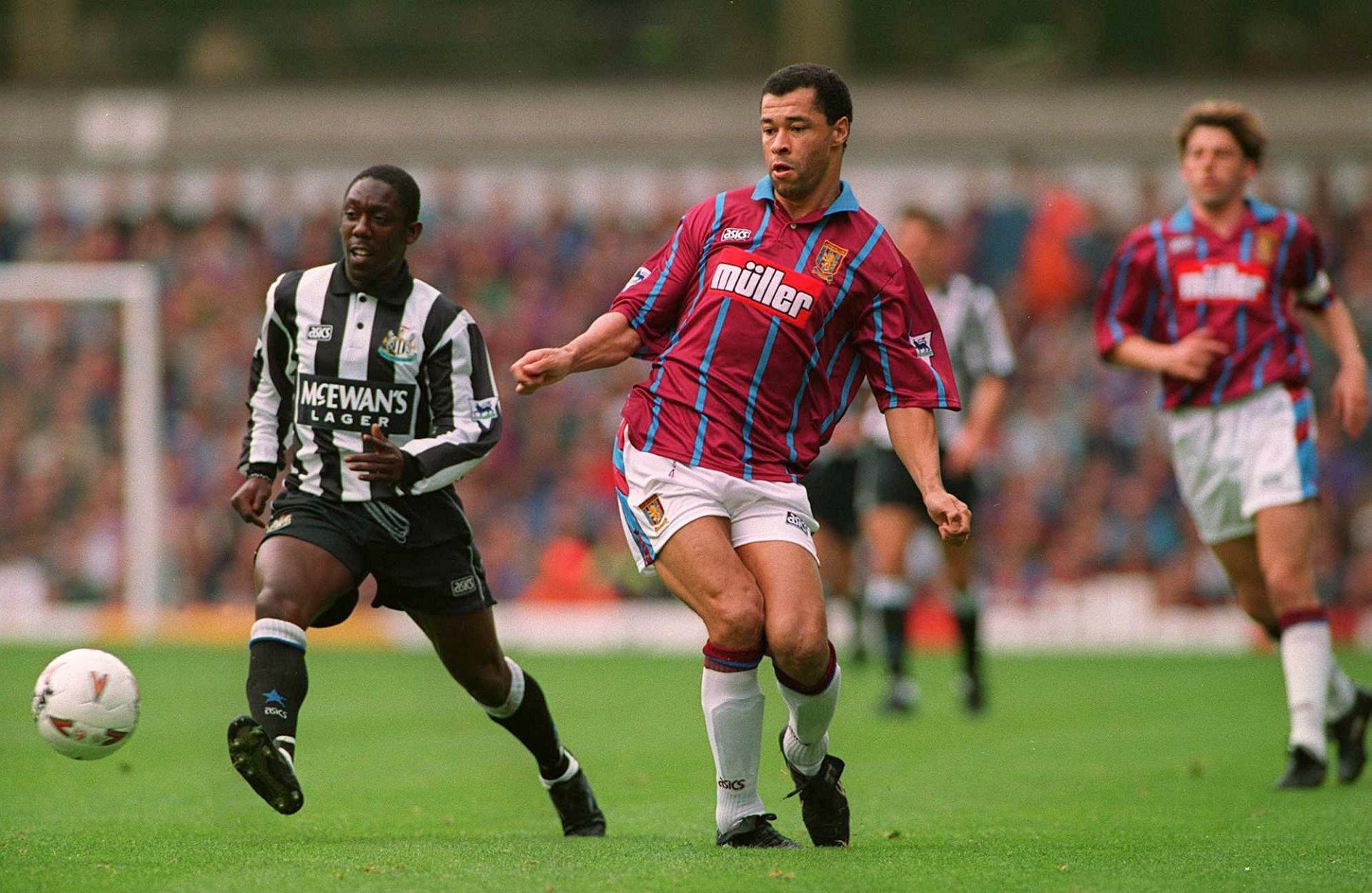 Andy Cole (left) in action for Newcastle United in 1994