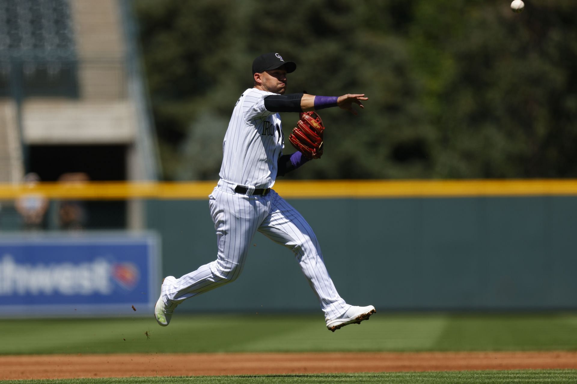 Miami Marlins shortstop Jose Iglesias throws to first during a