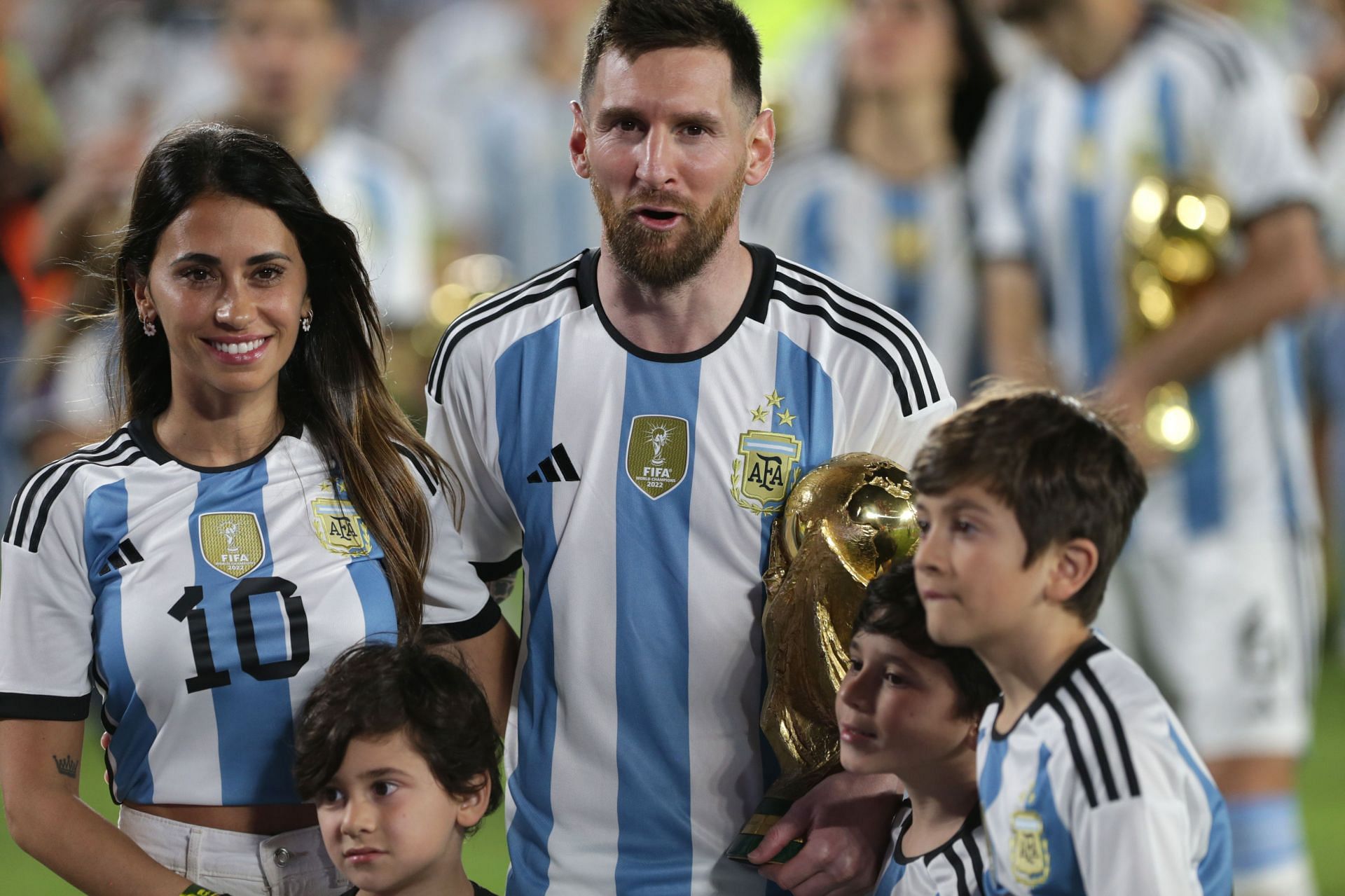 Antonela Roccuzzo, with Lionel Messi and their children, during Argentina v Panama
