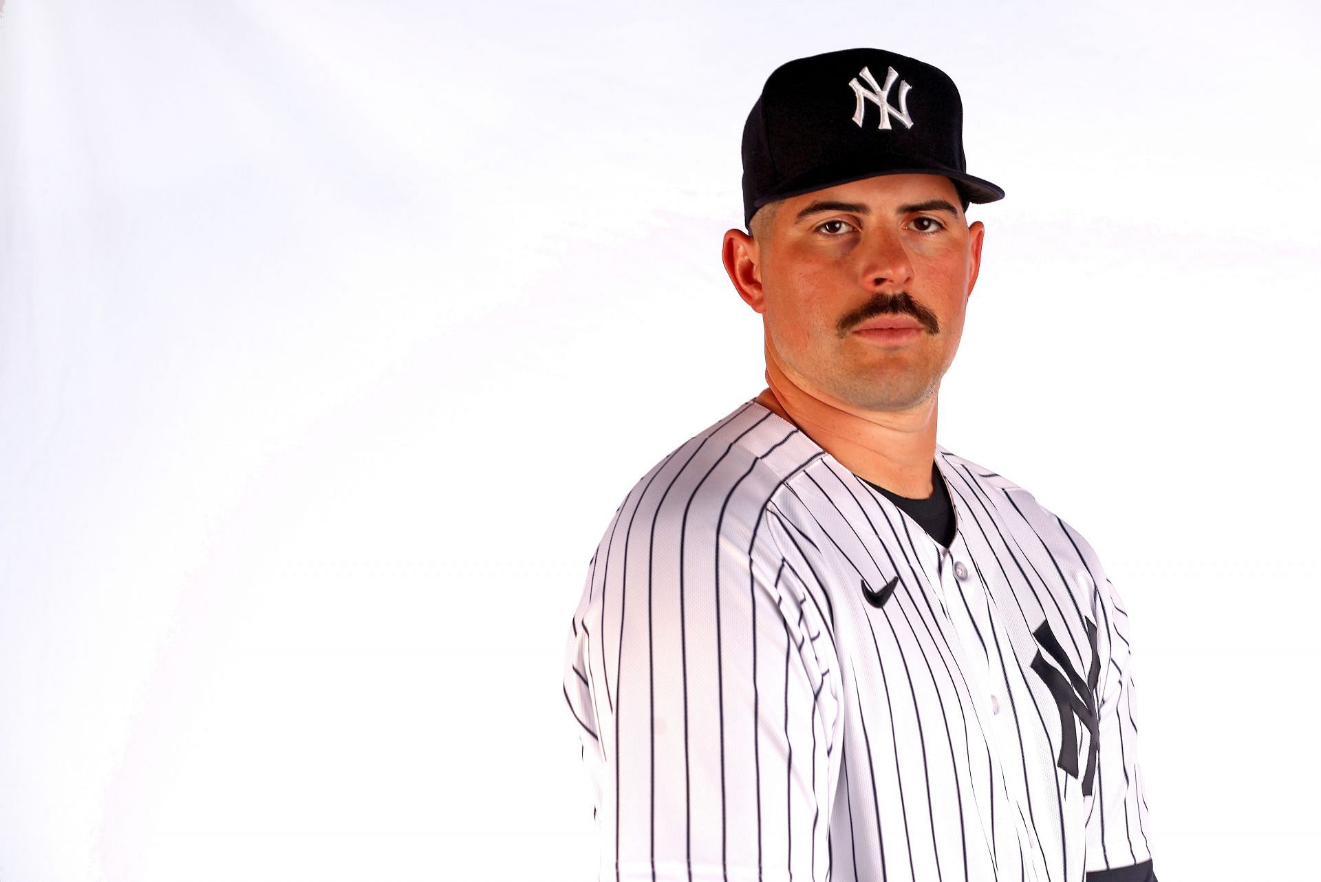 The Yankees bat boy with long hair may have had to adhere to the same policy as Carlos Rodon