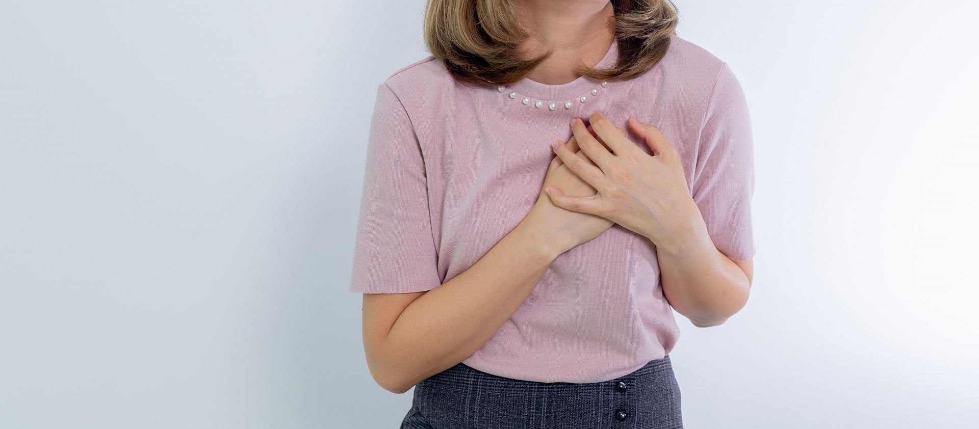 GERD can also cause heartburn or acid reflux. (Image via Pexels/puwadon sangngern)
