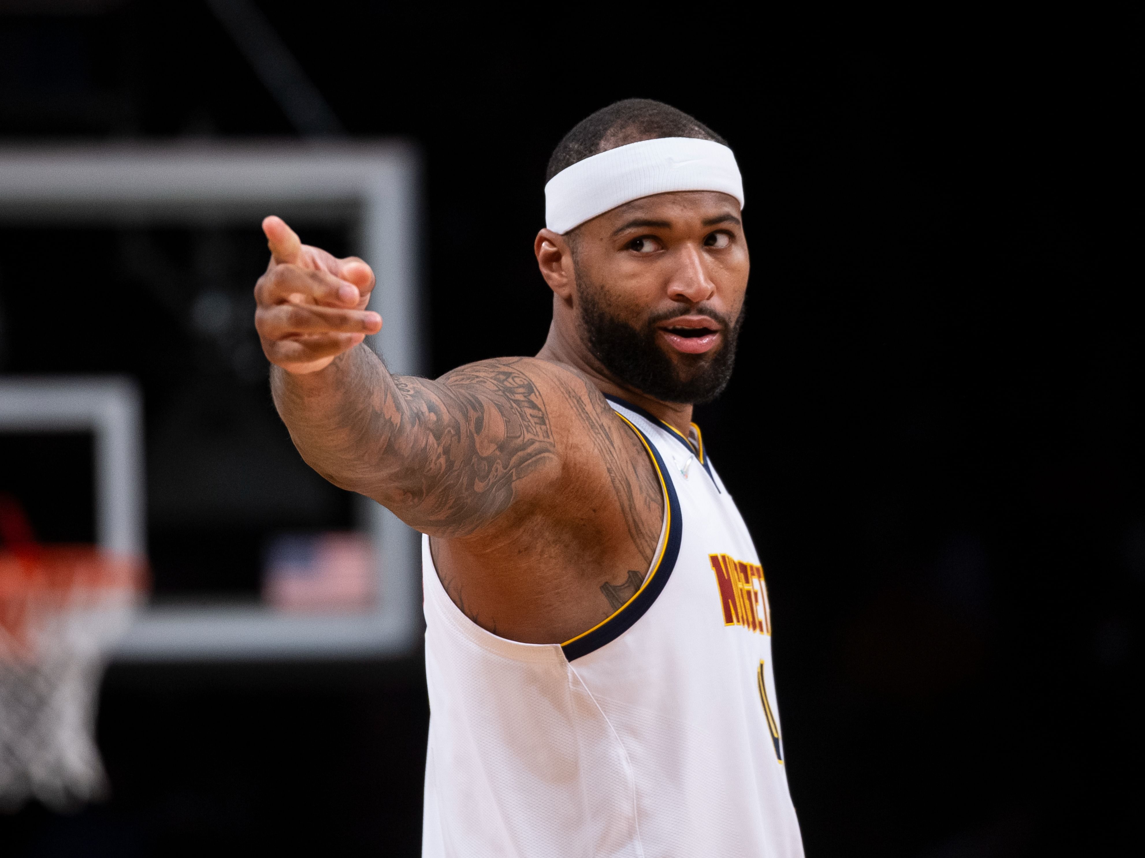DeMarcus Cousins playing for the Denver Nuggets