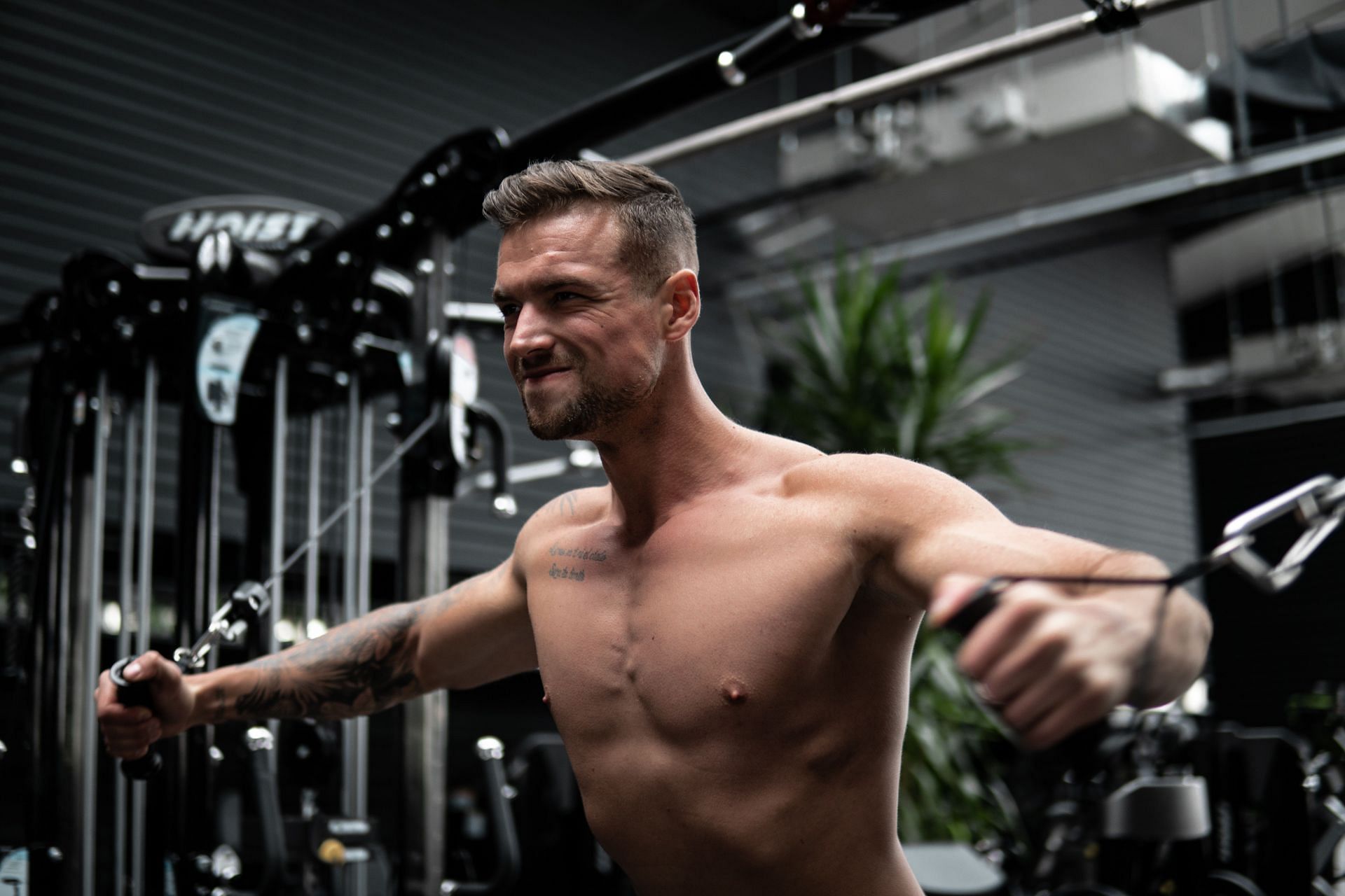 Cable lateral raise are one of the best shoulder exercises. (Image via Unsplash/ Milan Csizmadia)